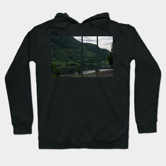 Wonderful landscapes in Norway. Green hill with mirror reflection on the water of the lake Gjerdesdalsvatnet . Norwegian Scenic Route Ryfylke. Trees and rocks in the background. Hoodie by fabbroni-art